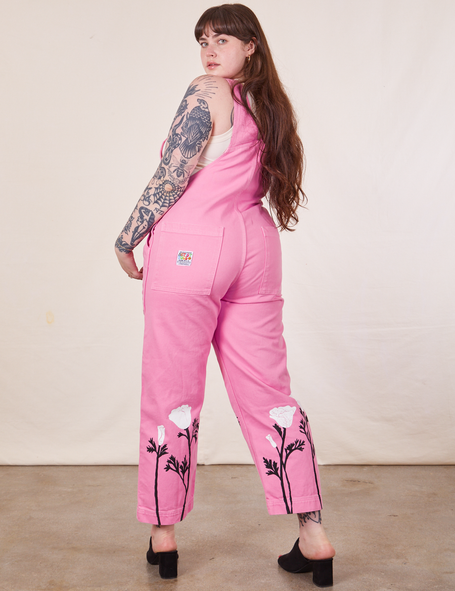 Back view of California Poppy Overalls in Bubblegum Pink worn by Sydney