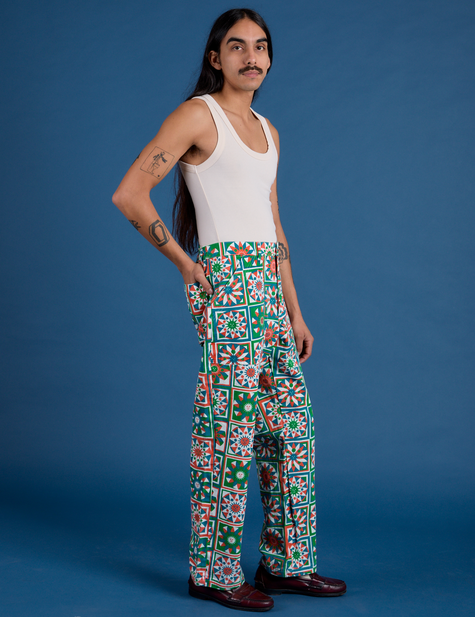 Side view of Work Pants in Quilt Print and vintage tee off-white Tank Top on Anthony