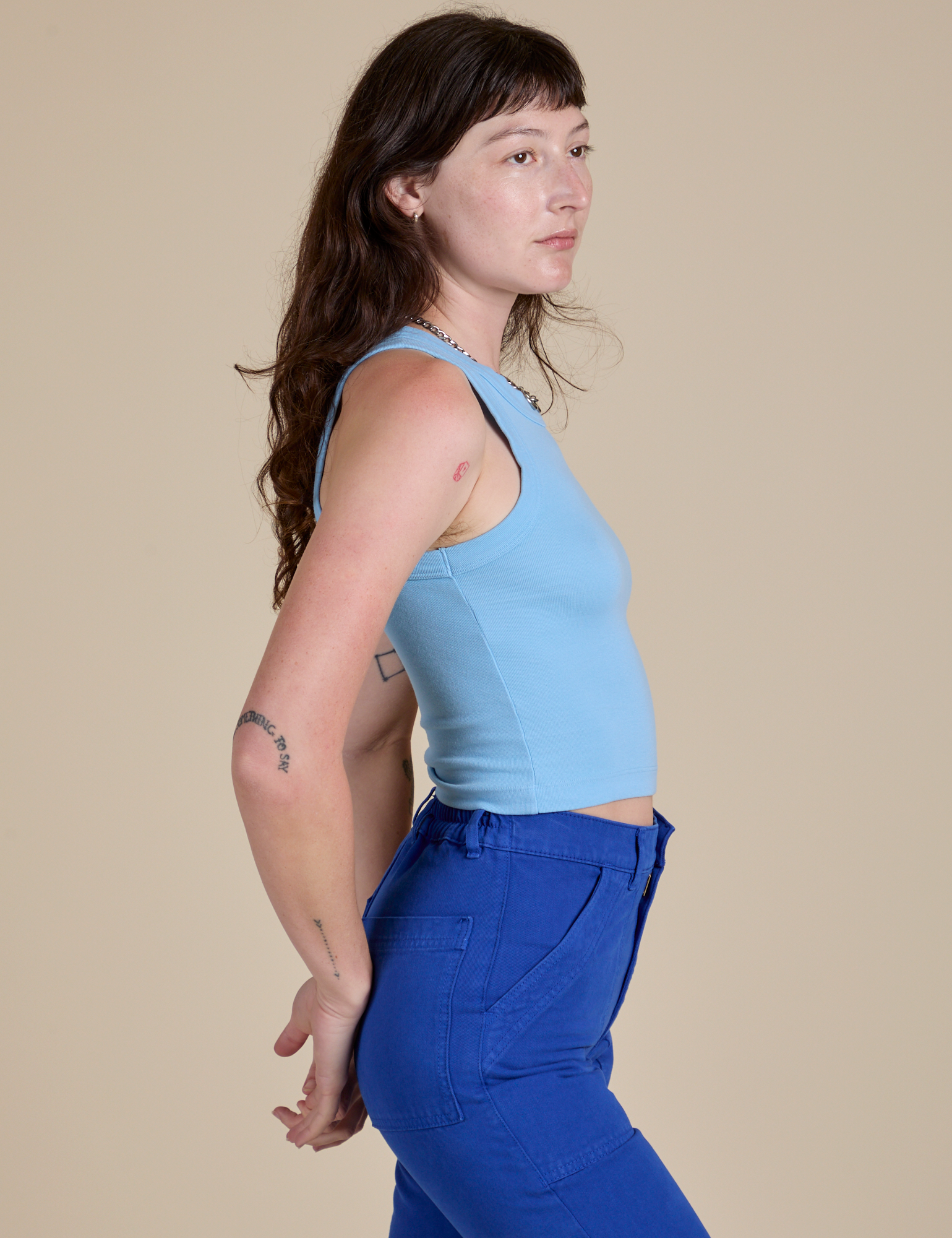 Racerback Tank in Baby Blue side view on Alex