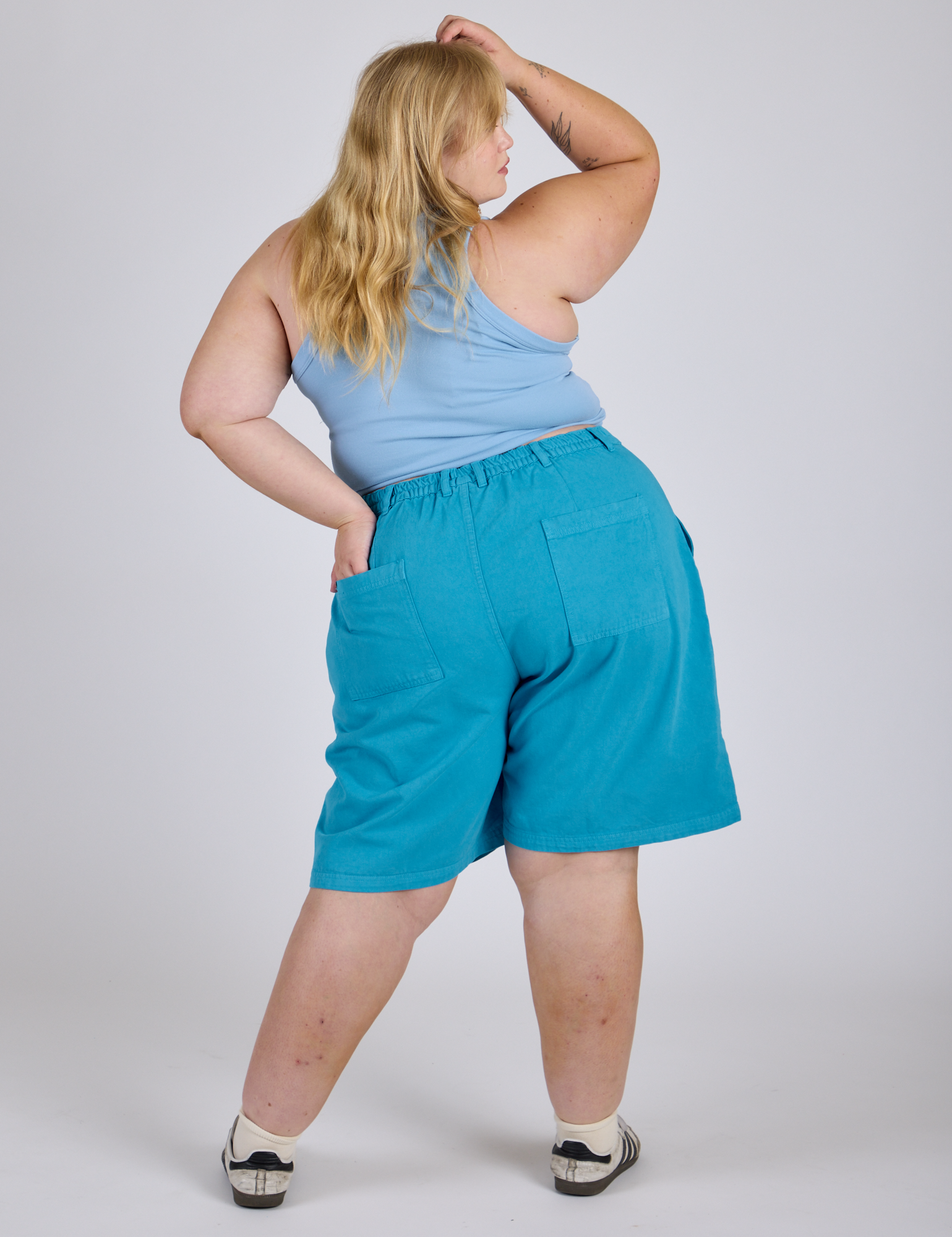 Longline Work Shorts in Hawaiian Blue back view on Juliet