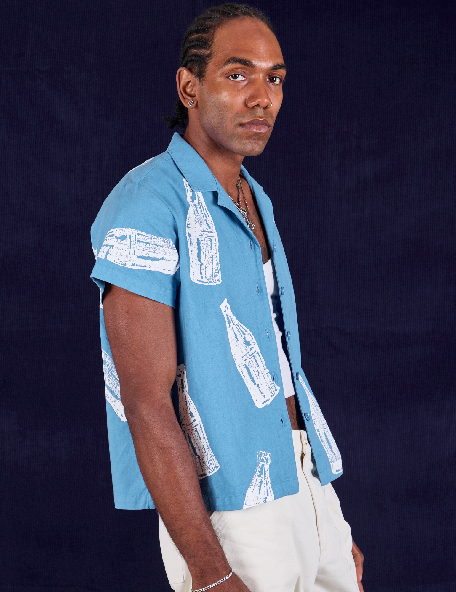 Soda Bottle Pantry Button-Up in Greek Blue side view on Jerrod
