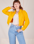 Ricky Jacket in Sunshine Yellow and vintage off-white Tank Top worn by Alex