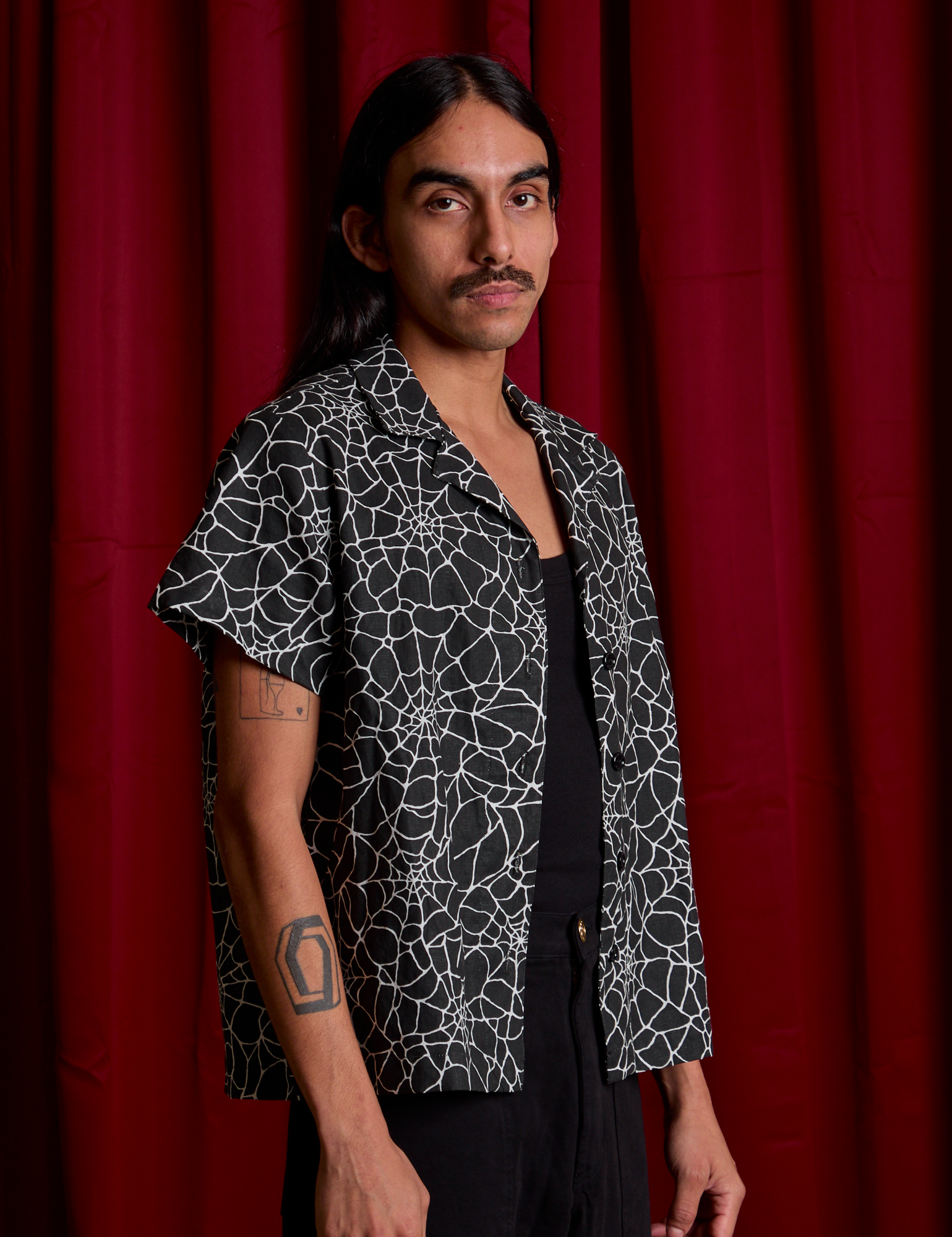 Angled front view of Spider Webs Pantry Button-Up on Anthony