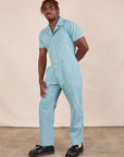 Short Sleeve Jumpsuit in Baby Blue angled front view on Issac