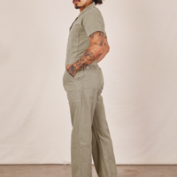 Side view of Short Sleeve Jumpsuit in Khaki Grey worn by Jesse