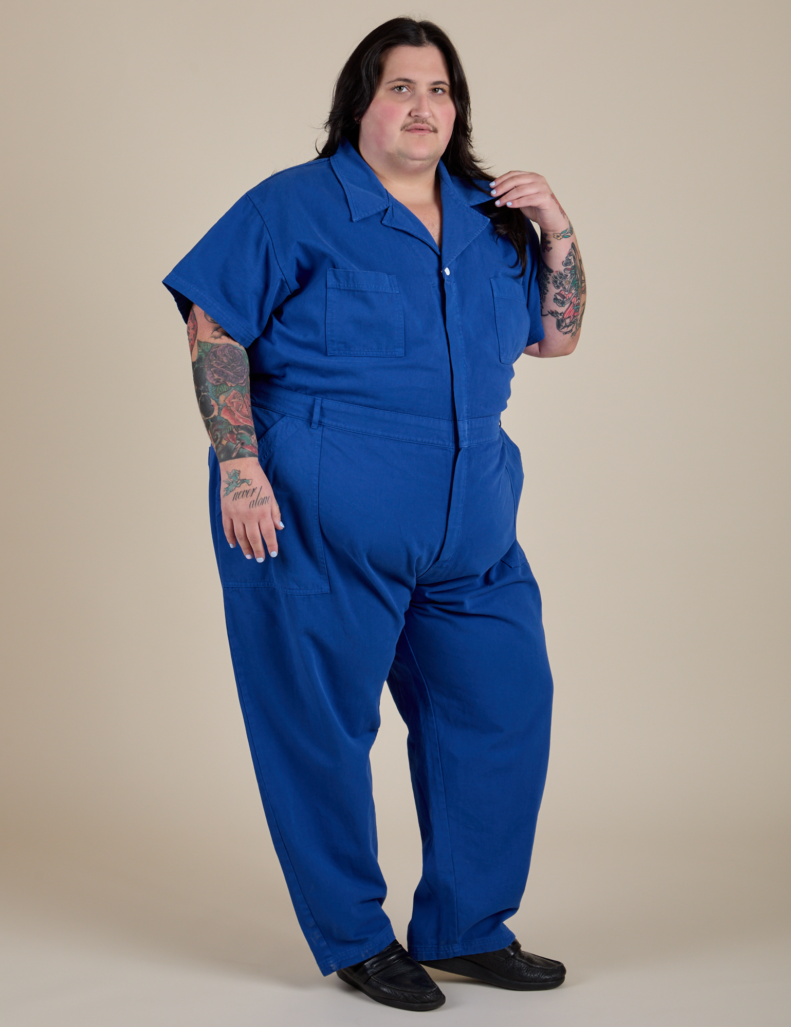 Angled front view of Short Sleeve Jumpsuit in Royal Blue on Sam