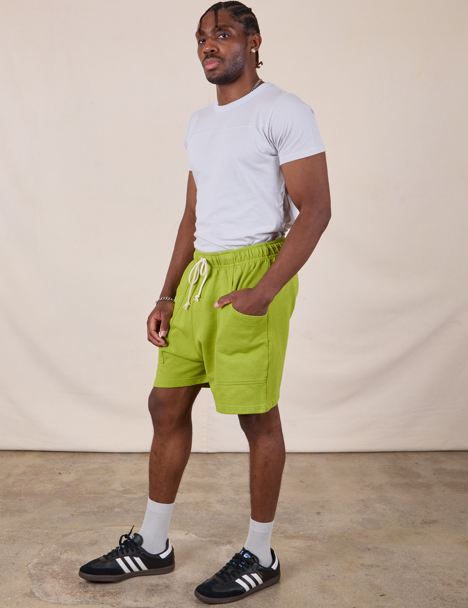 Sweat Shorts in Gross Green side view on Isaac