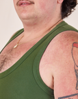 Upper front close up of Tank Top in Dark Emerald Green on Sam