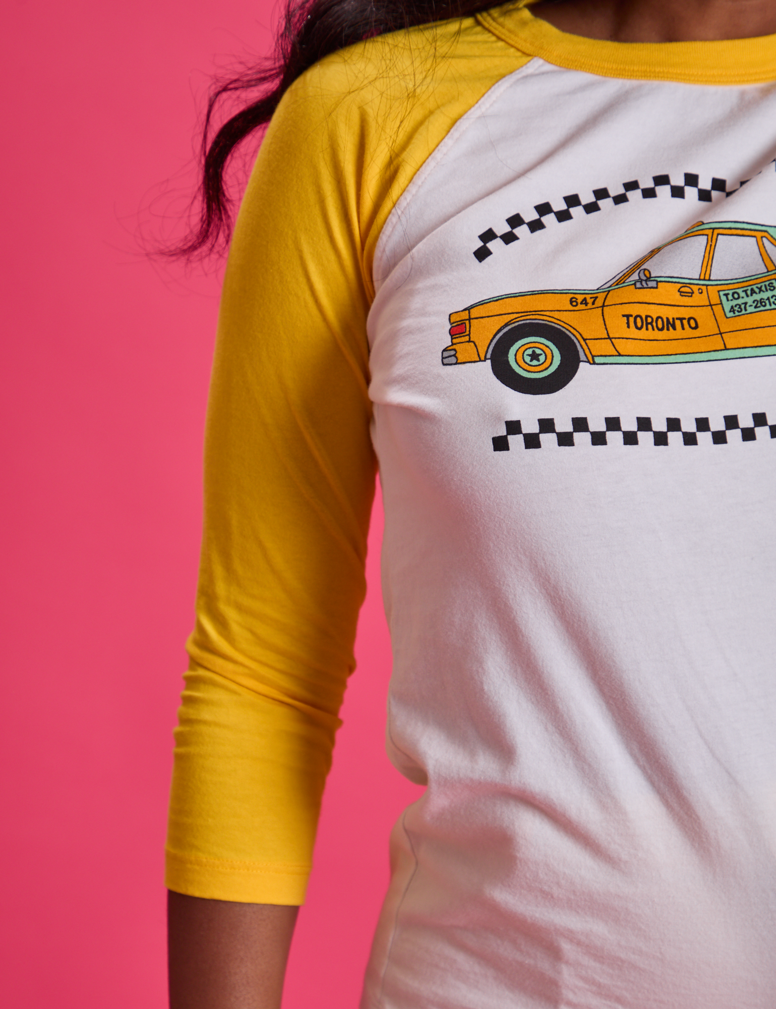 Taxi Raglan Tee in Toronto close up on Kandia