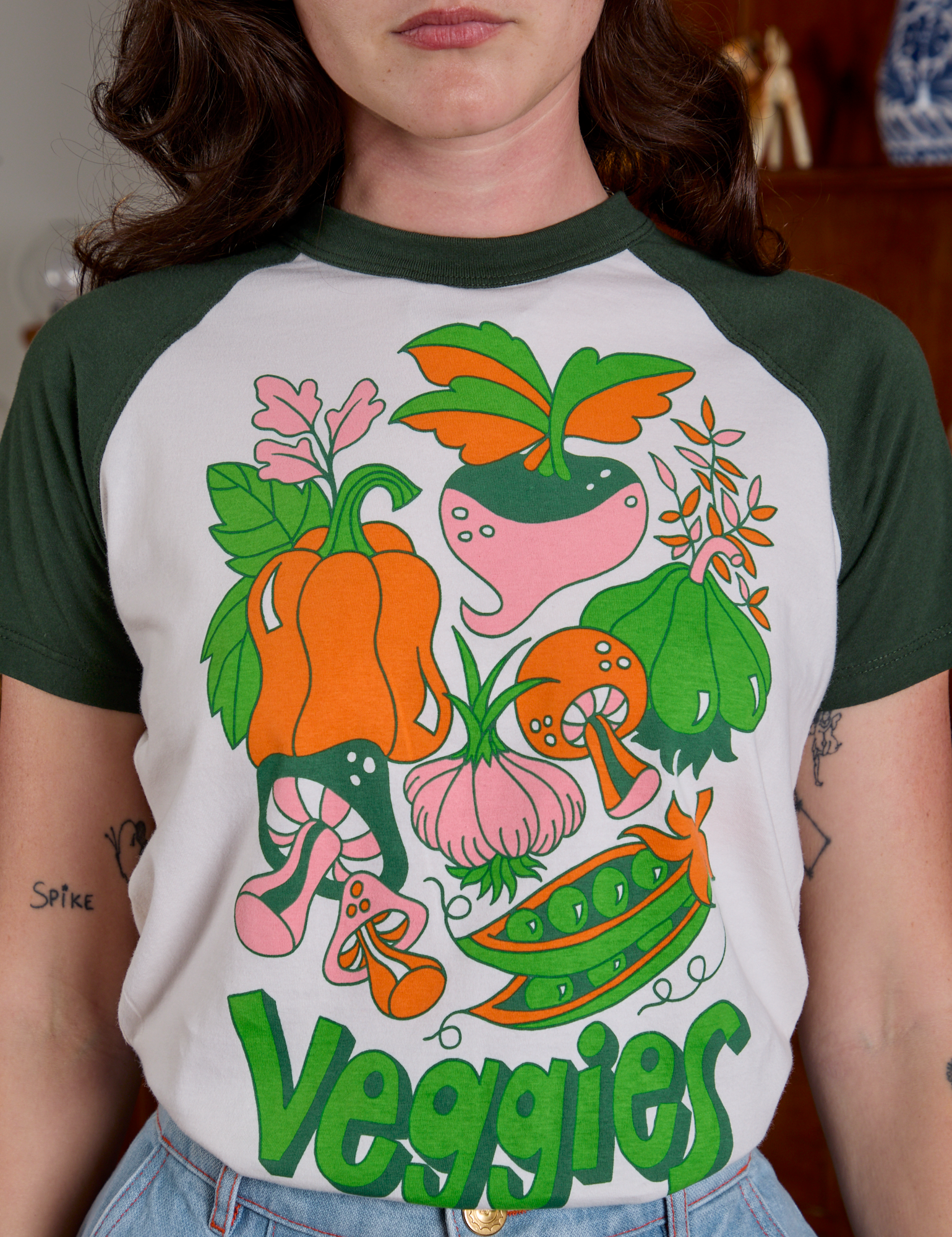 Short Sleeve Raglan Tee in Veggies front close up on Alex