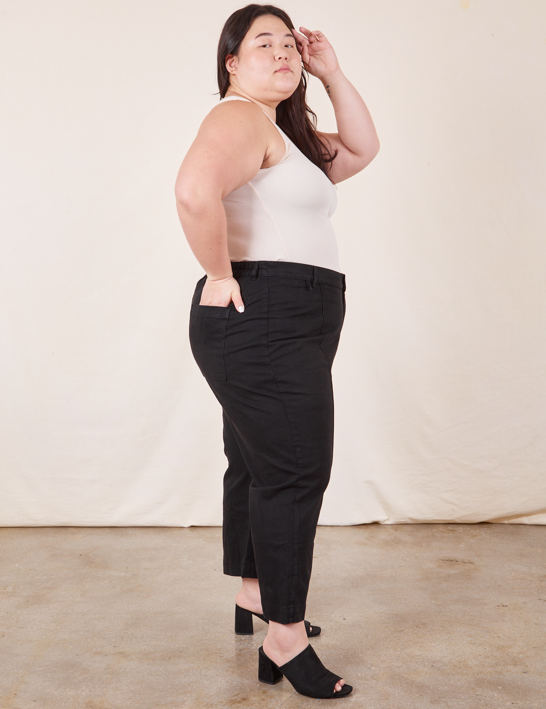 Western Pants in Basic Black side view on Ashley wearing vintage off-white Tank Top