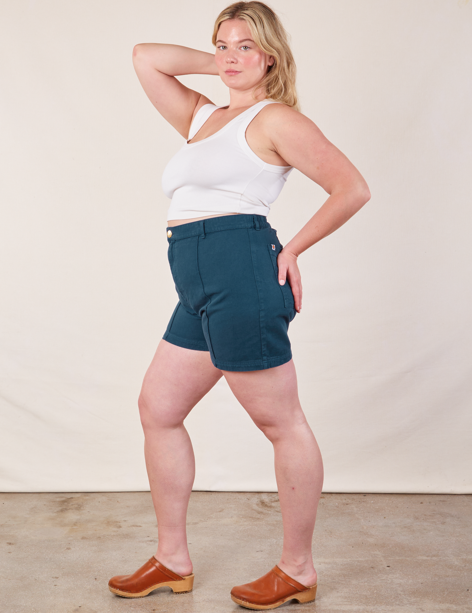 Side view of Western Shorts in Lagoon and Cropped Tank in vintage tee off-white on Lish