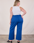 Back view of Western Pants in Royal Blue and Cropped Tank in Vintage Tee Off-White on Lish