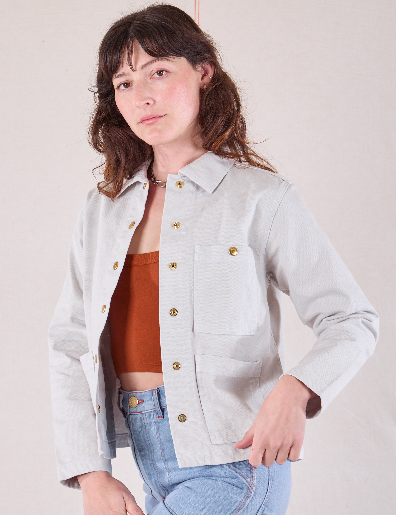 Denim Work Jacket in Stone White angled front view on Alex