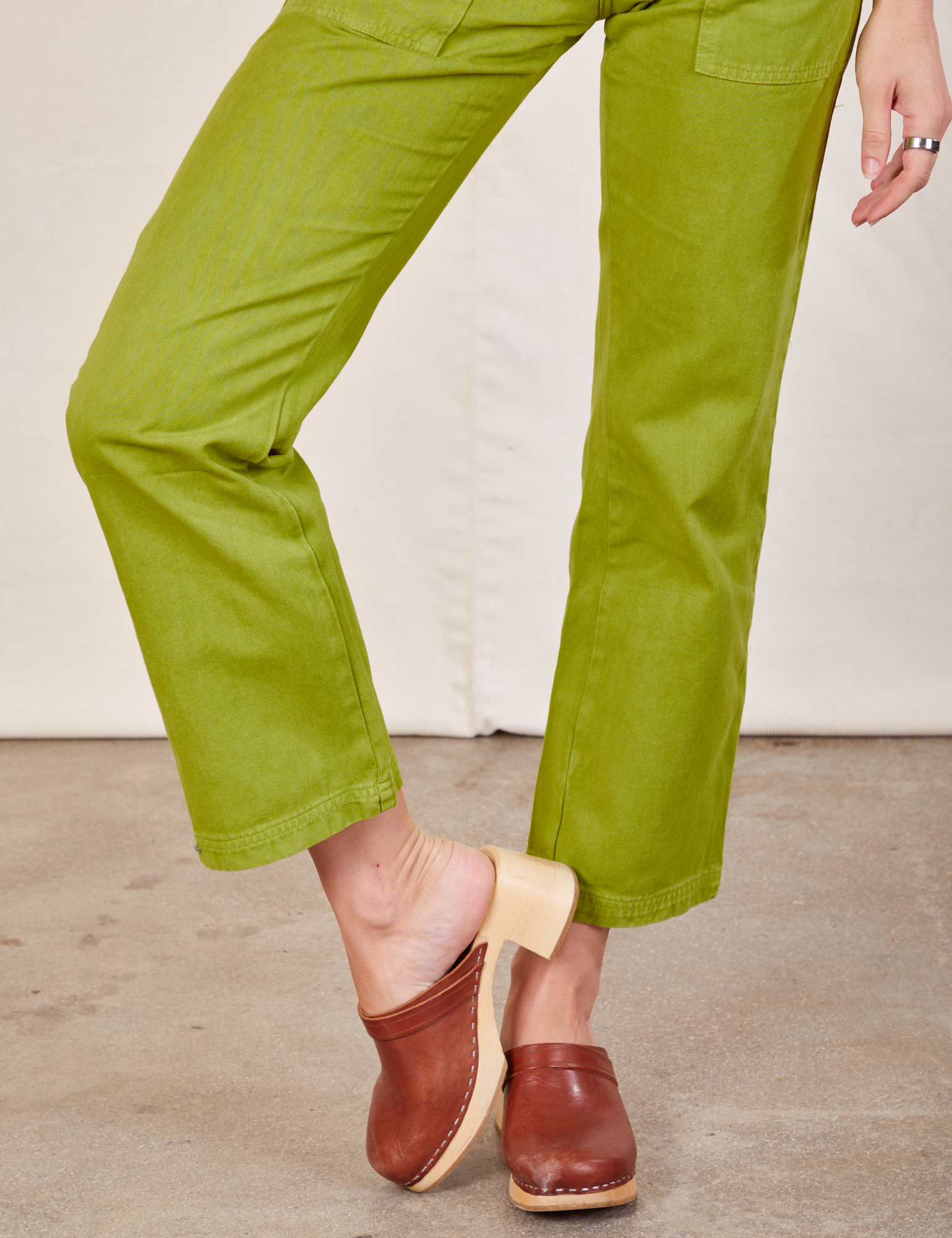 Work Pants in Gross Green pant leg close up on Alex