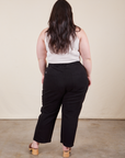 Work Pants in Basic Black back view on Ashley wearing vintage off-white Tank Top