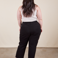 Work Pants in Basic Black back view on Ashley wearing vintage off-white Tank Top