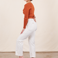 Work Pants in Vintage Off-White side view on Soraya wearing a burnt terracotta Wrap Top