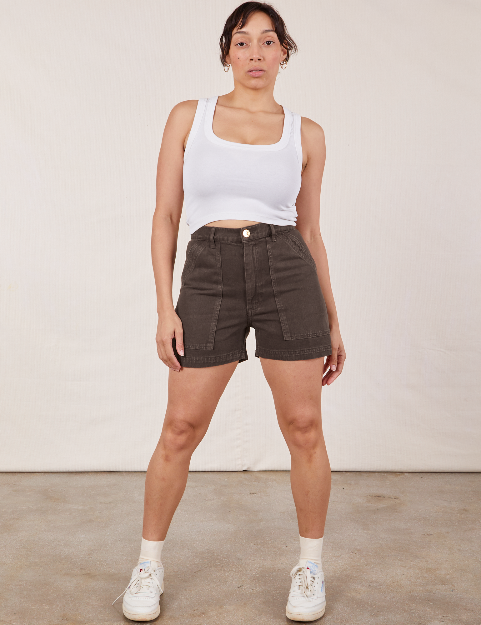 Tiara is wearing Classic Work Shorts in Espresso Brown and Cropped Tank Top in vintage tee off-white