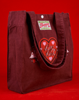 Angled front view of Love Big Bud Shopper Tote