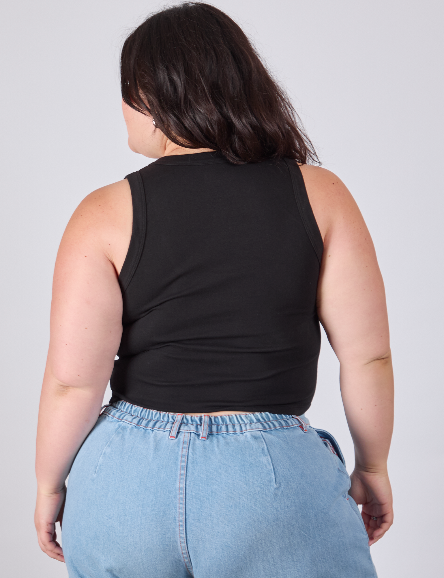 Cropped Tank Top in Basic Black back view on Ashley