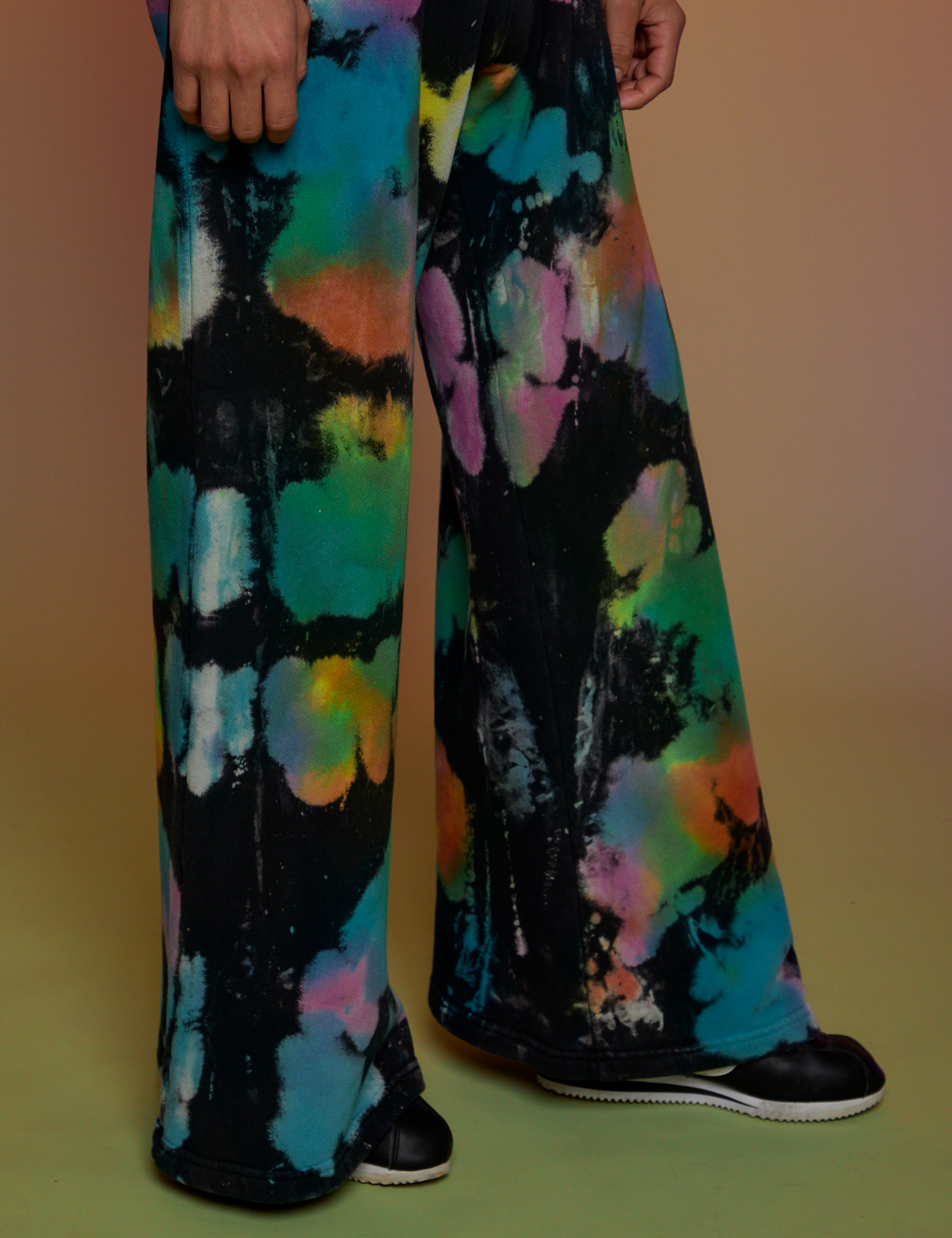 Pant leg close up of Tie Dyed Wide Leg Sweat Pants on Anthony