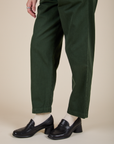 Heavyweight Trousers in Swamp Green pant leg close up on Alex