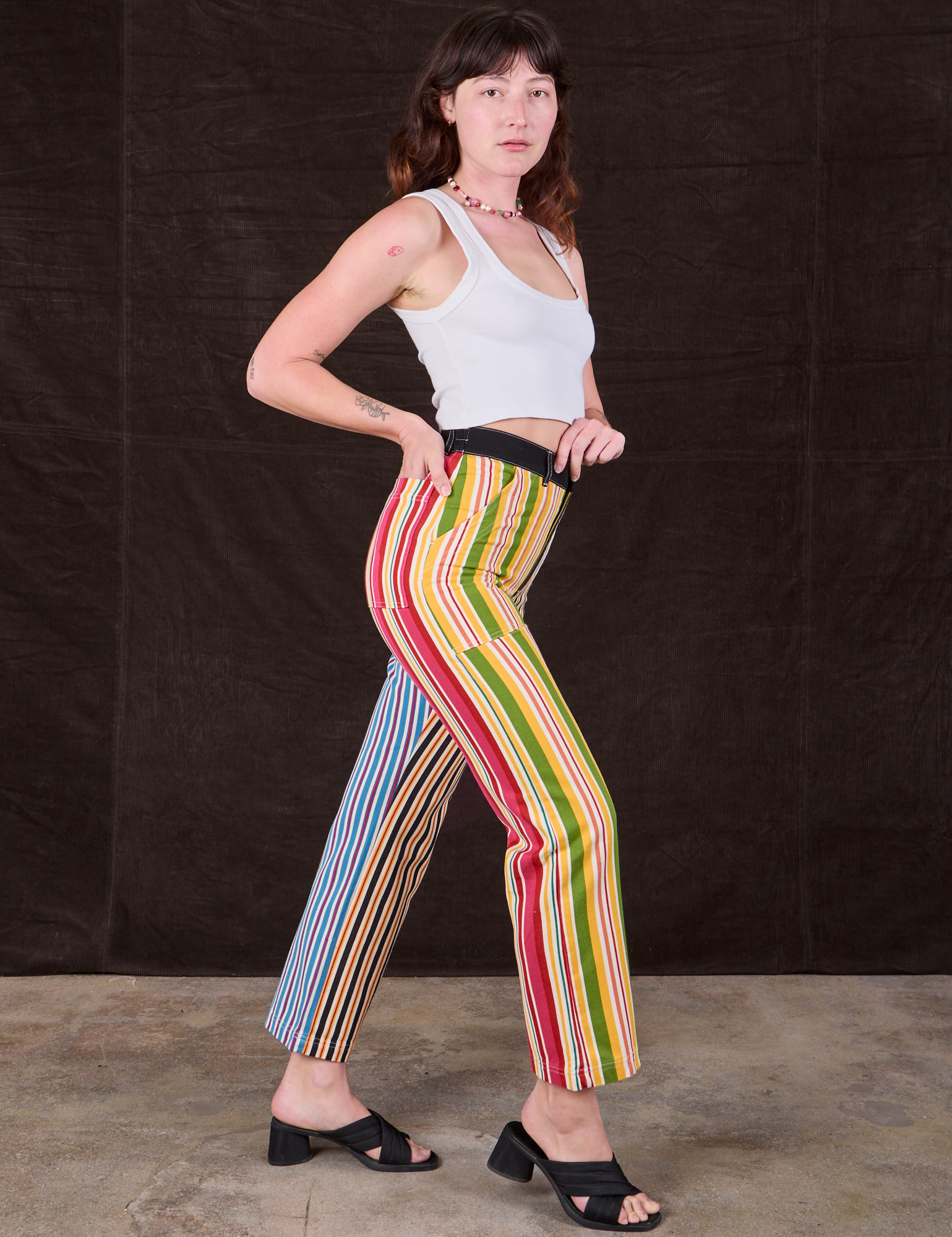 Side view of Mixed Stripe Work Pants and Cropped Tank in vintage tee off-white