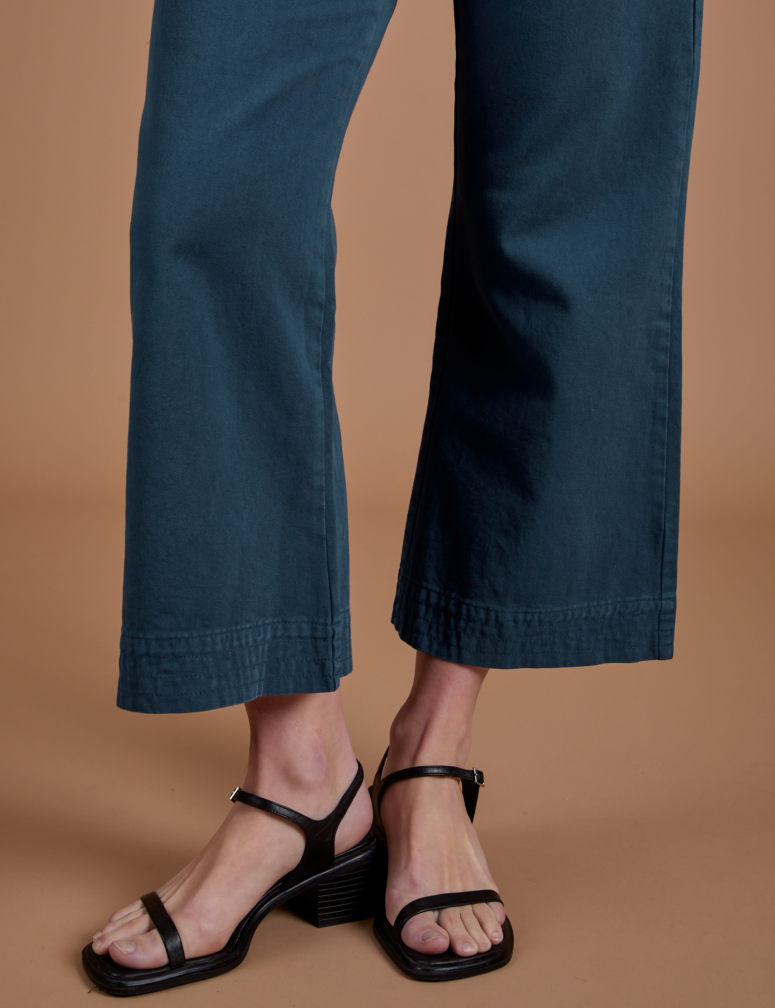 Action Pants in Lagoon pant leg close up on Alex