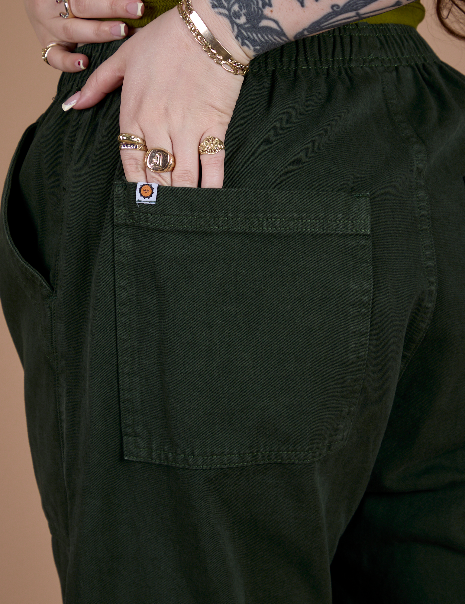 Action Pants in Swamp Green back pocket close up on Sydney