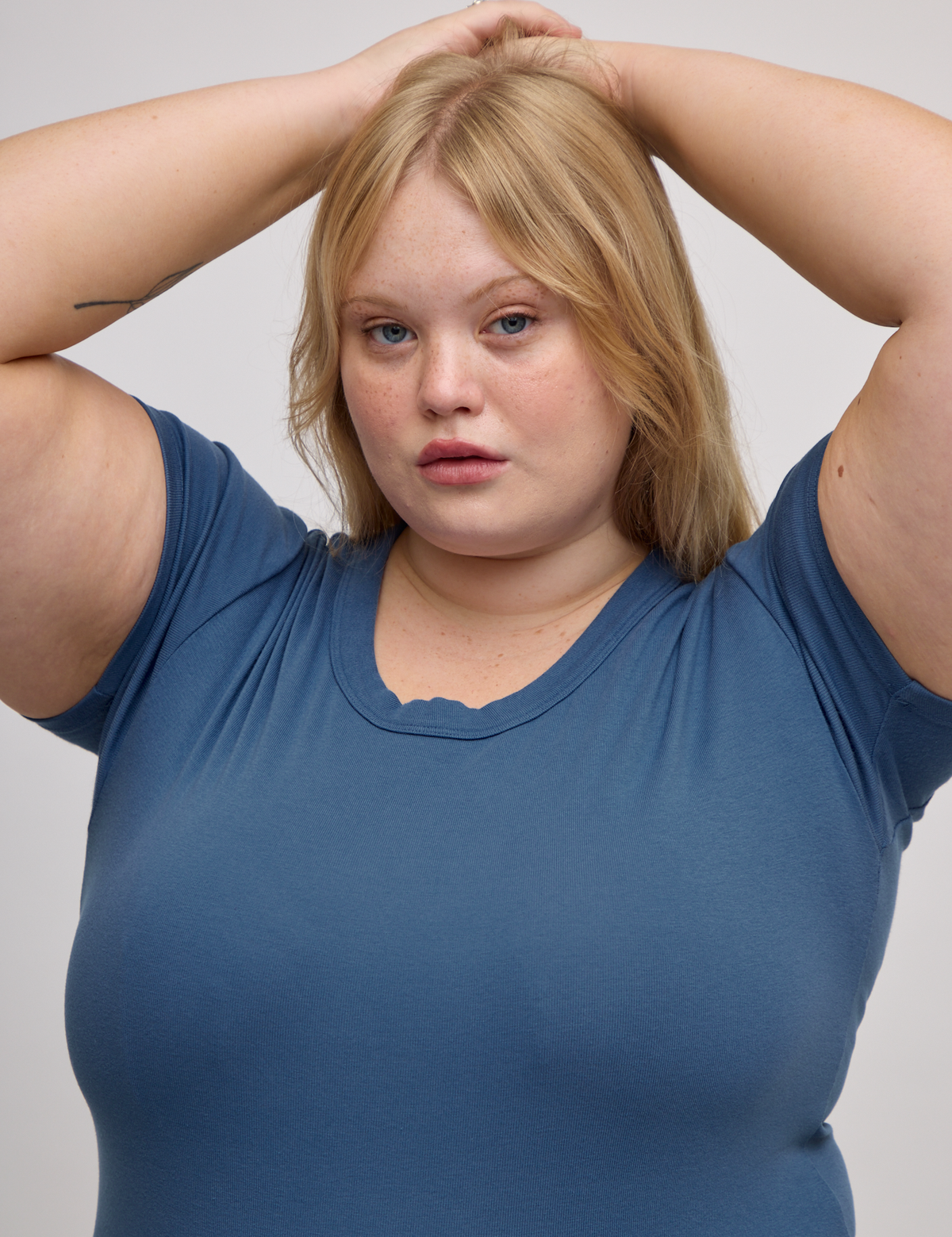 Front close up of Baby Tee in French Blue on Juliet