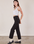 Side view of Work Pants in Black and Cropped Tank in vintage tee off-white