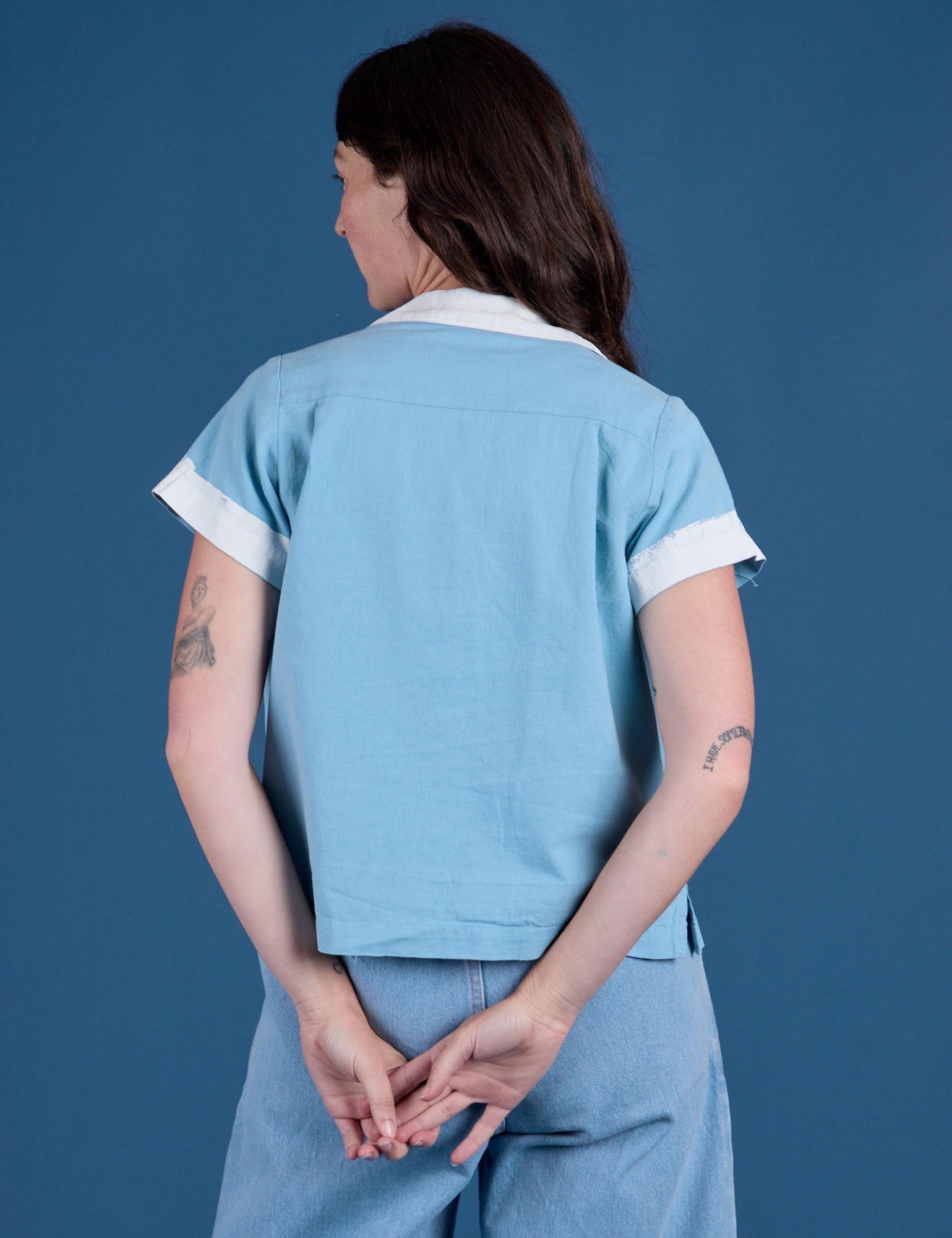 Painted Pantry Button-Up in Baby Blue back view on Alex