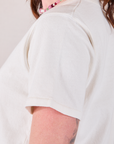 Burly Tee in Vintage Tee Off-White sleeve close up on Alex