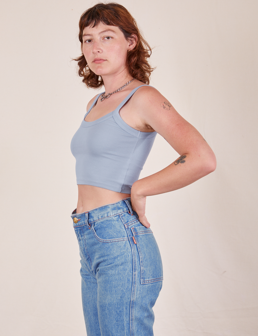 Side view of Cropped Cami in Periwinkle and light wash Frontier worn by Alex