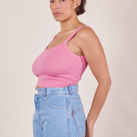 Side view of Cropped Cami in Bubblegum Pink and light wash Sailor Jeans worn by Tiara