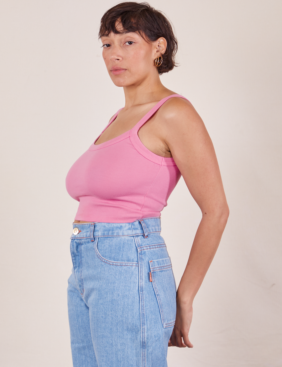Side view of Cropped Cami in Bubblegum Pink and light wash Sailor Jeans worn by Tiara