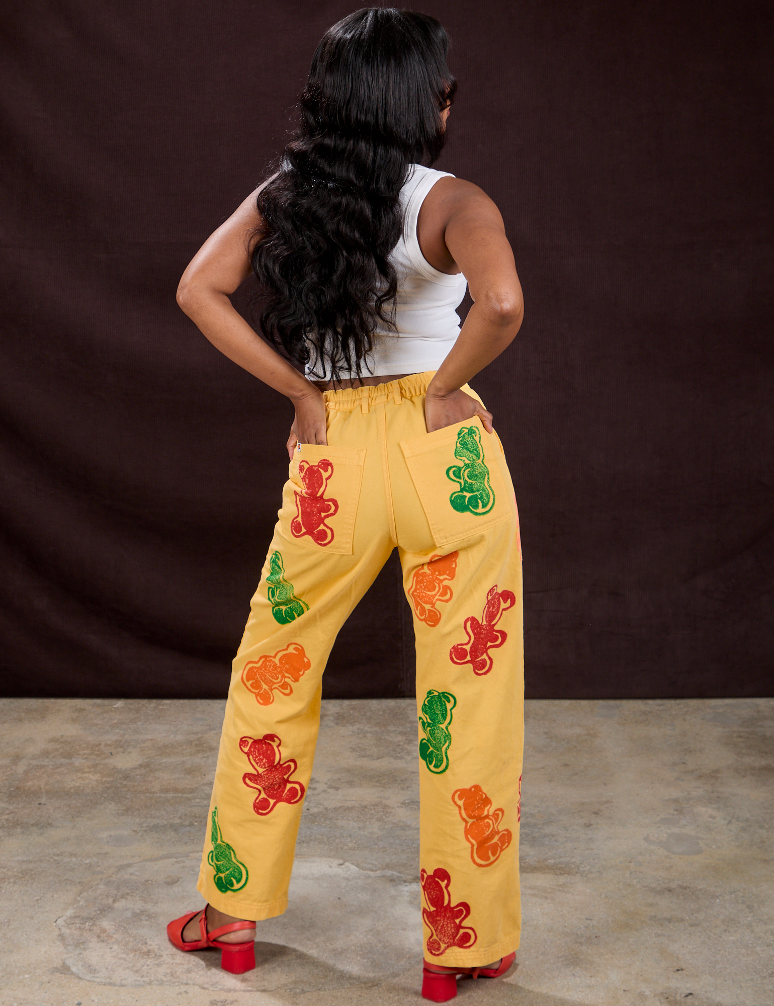 Gummy Bear Paintstamped Work Pants in Butter Yellow back view on Kandia