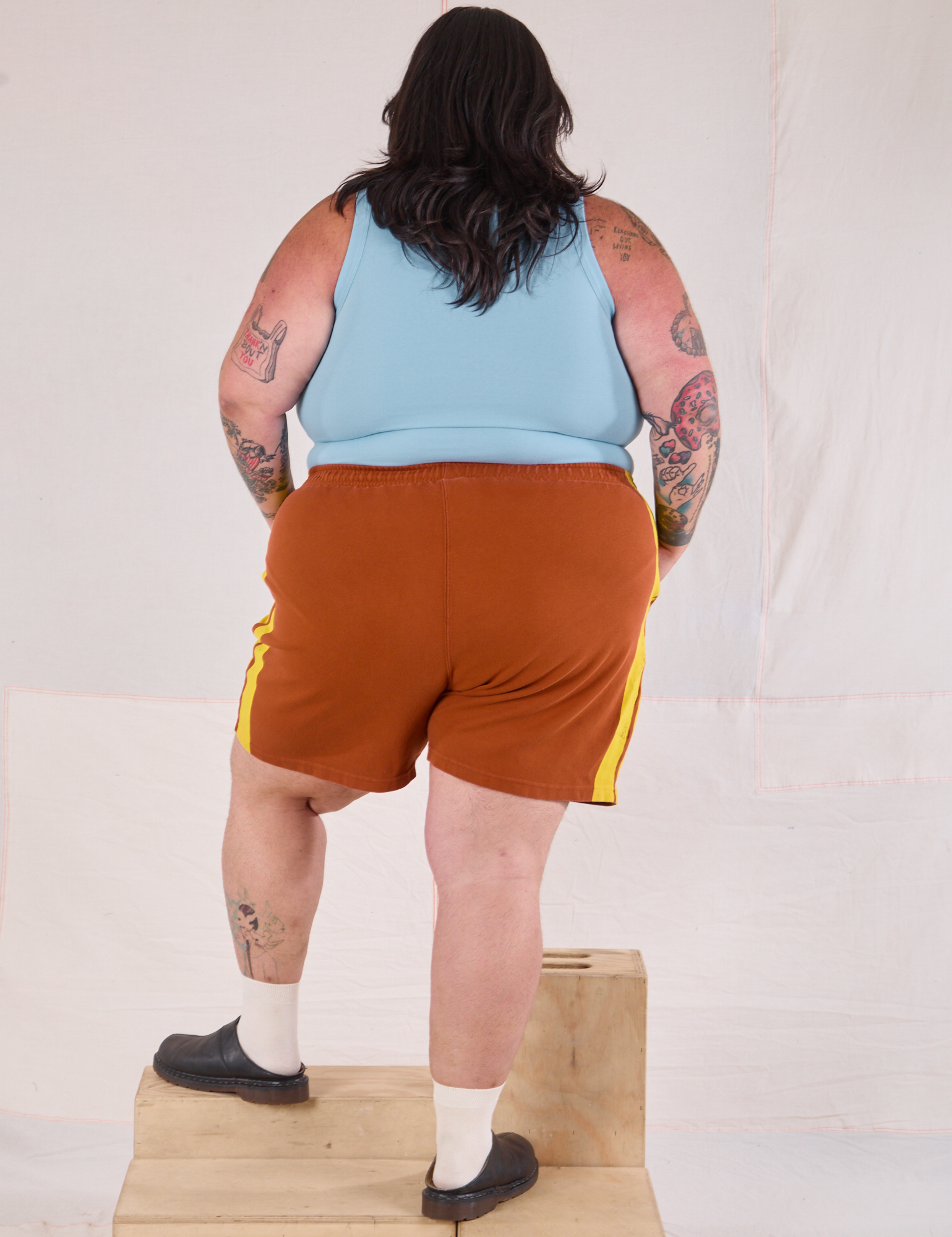 Painted Stripe Easy Shorts in Burnt Terracotta back view on Sam