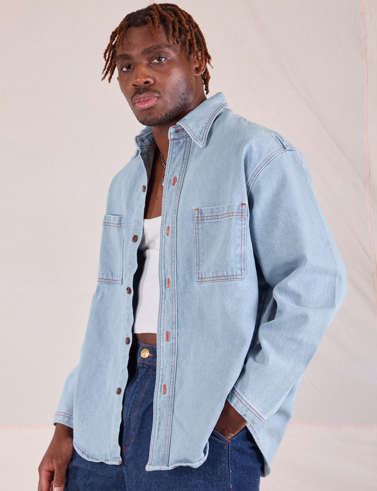 Denim Overshirt in Light Wash angled front view on Issac