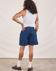 Back view of Denim Trouser Shorts in Dark Wash and Cropped Tank in vintage tee off-white on Jesse