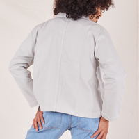 Back view of Denim Work Jacket in Dishwater White worn by Jesse