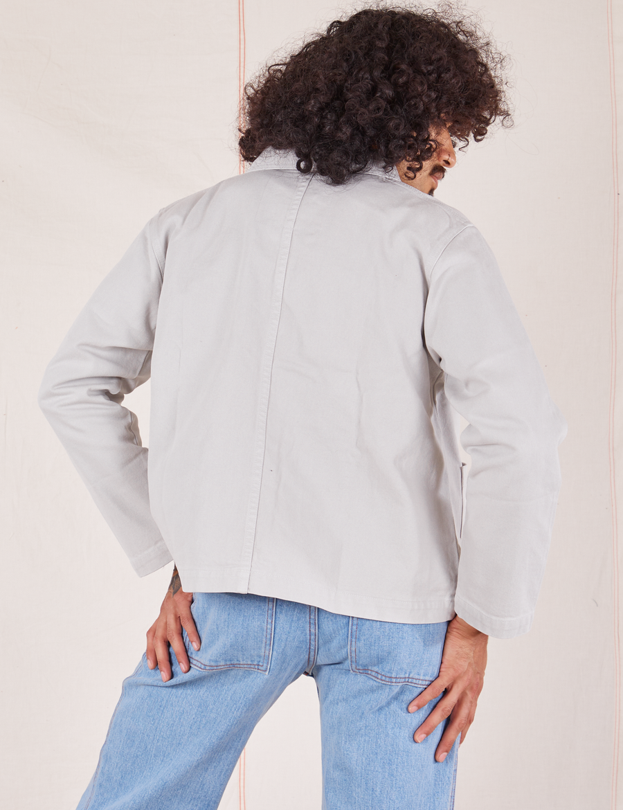 Back view of Denim Work Jacket in Dishwater White worn by Jesse