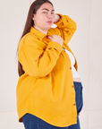 Side view of Flannel Overshirt in Mustard Yellow on Marielena
