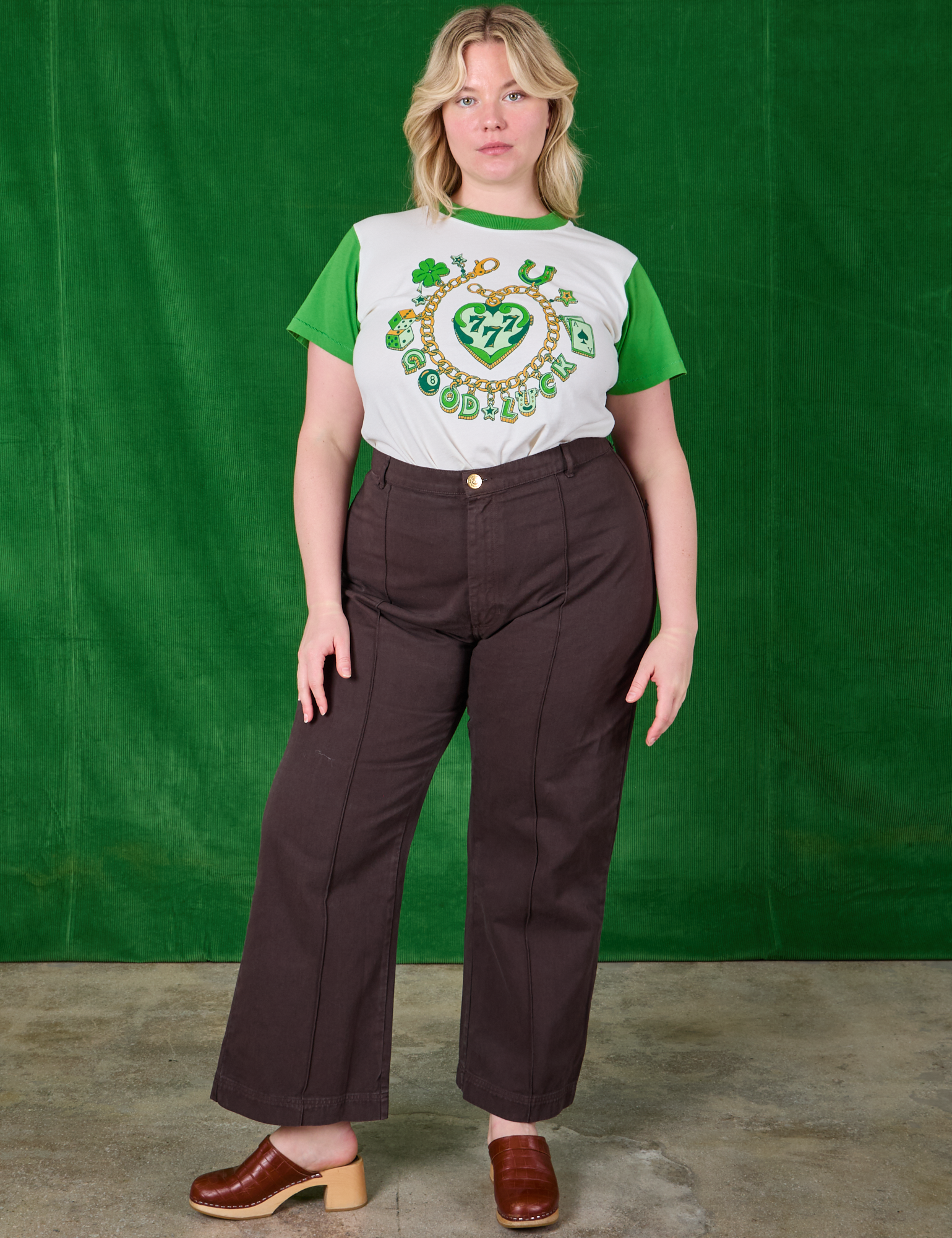 Lish is wearing Lucky Charm Organic Tee tucked into espresso brown Western Pants