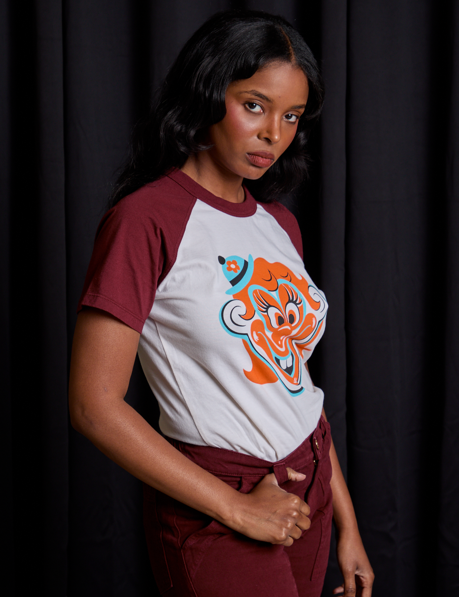 Side view of Raglan Tee in Clown on Kandia
