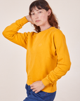 Angled view of Heavyweight Crew in Mustard Yellow worn by Alex