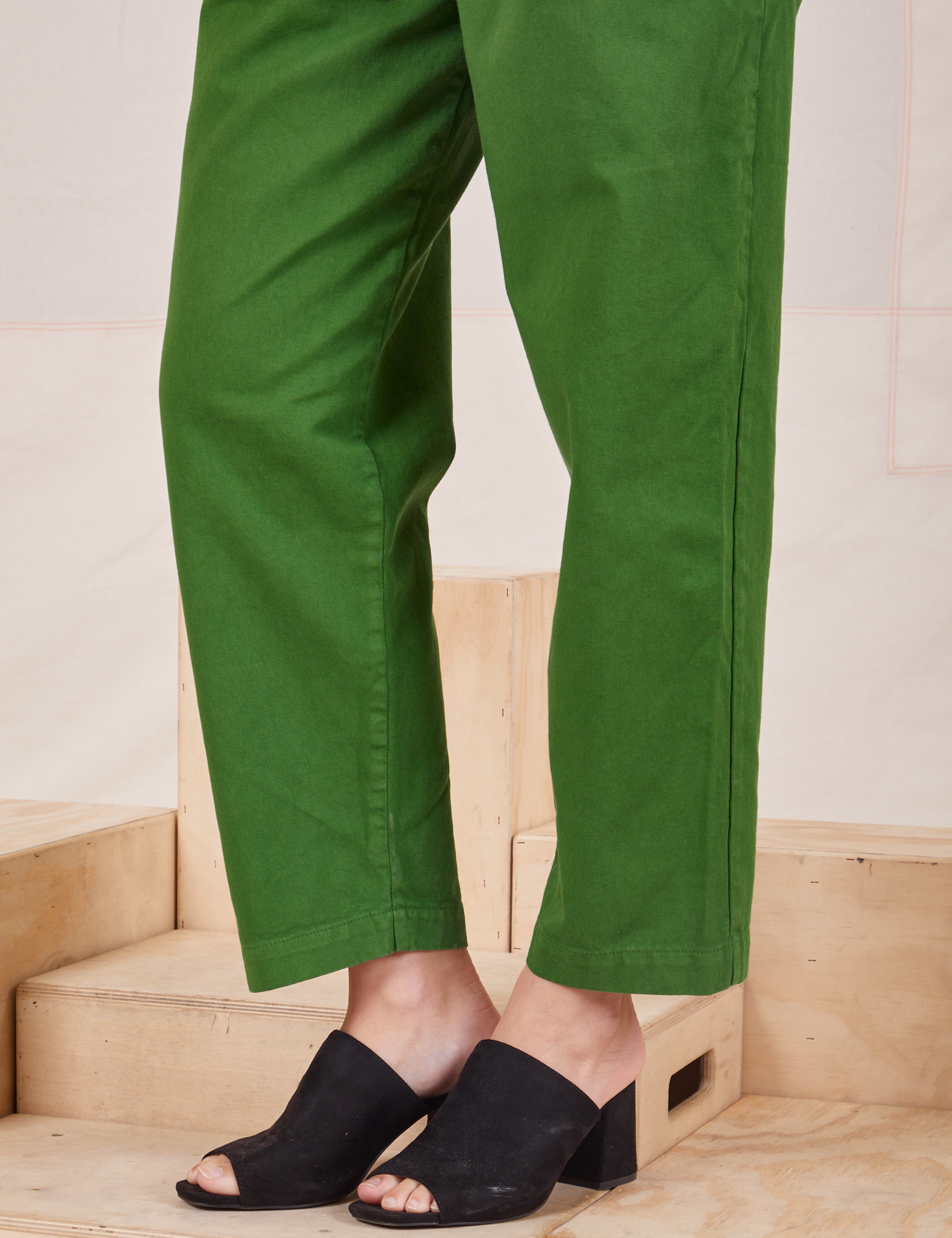 Side view pant leg close up of Heavyweight Trousers in Lawn Green on Alex