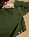 Back view of Heritage Mechanic Jacket in Evergreen on Alex
