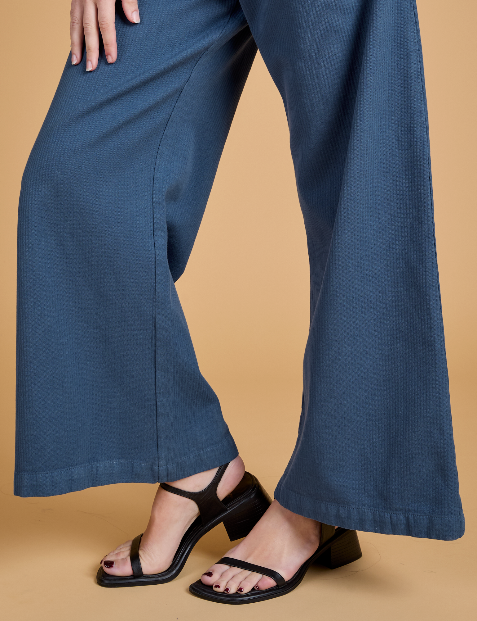 Pant leg close up of Heritage Wide Leg Trousers in French Blue on Alex